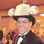 Mark-Kretz-sporting-a-very-luxurious-Rolls-Royce-hat